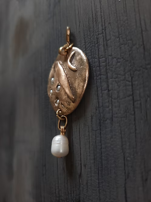 Moonbird Amulet Charm